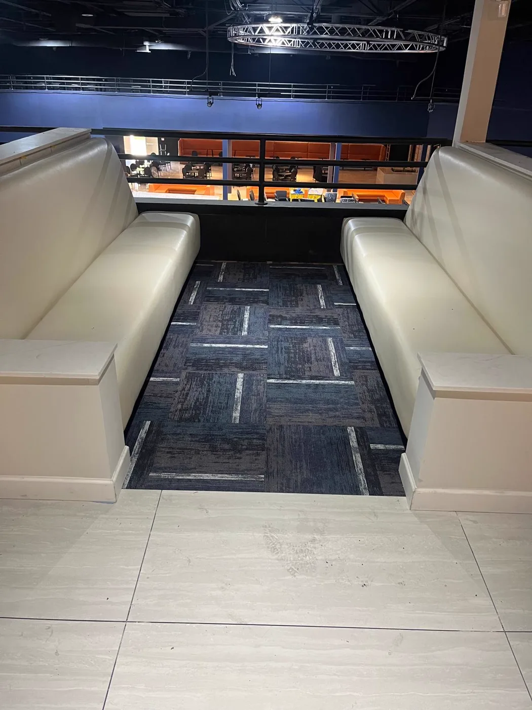 Booth seating area with new carpet tile, commercial venue renovation, Metro Atlanta